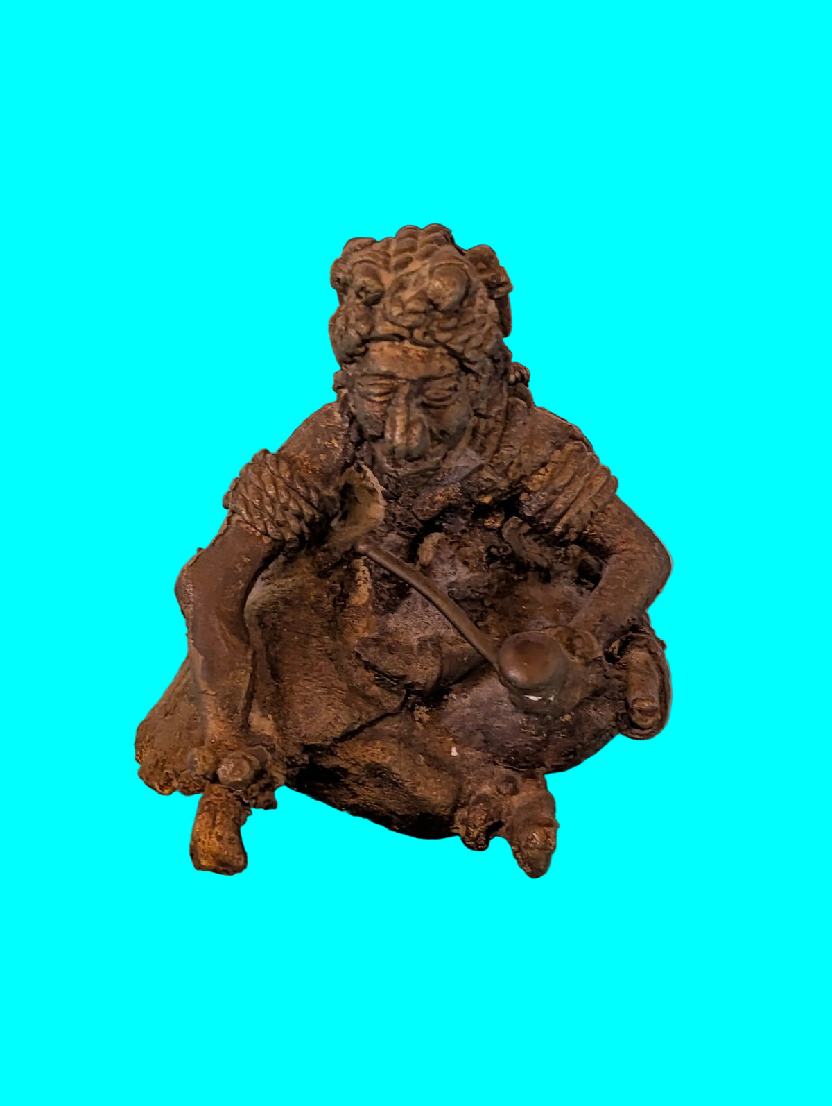 STATUETTE ANTIQUE EN BRONZE OU MÉTAL D'UNE DIVINITÉ MASCULINE ASSISE